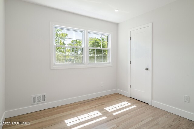 10 Pepperidge Rd, Howell, NJ 07731 - unfurnished room with baseboards, wood finished floors, and recessed lighting