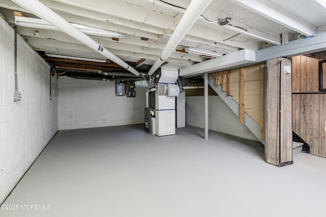 10 Pepperidge Rd, Howell, NJ 07731 - unfinished basement featuring heating unit, stairs, concrete block wall, and electric panel