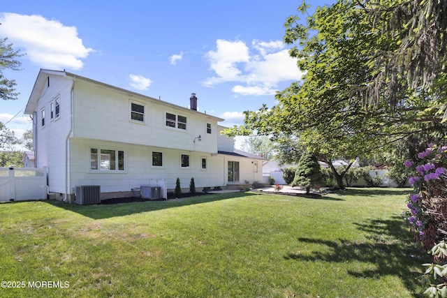 10 Pepperidge Rd, Howell, NJ 07731 - back of house featuring central air condition unit, a chimney, and a patio