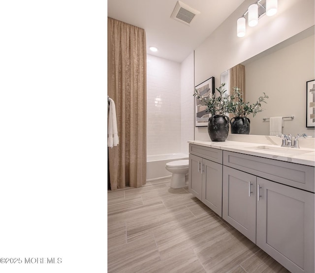 201 Sunset Ave Unit 110, Asbury Park, NJ 07712 - full bathroom with toilet, vanity, shower / tub combo, and recessed lighting