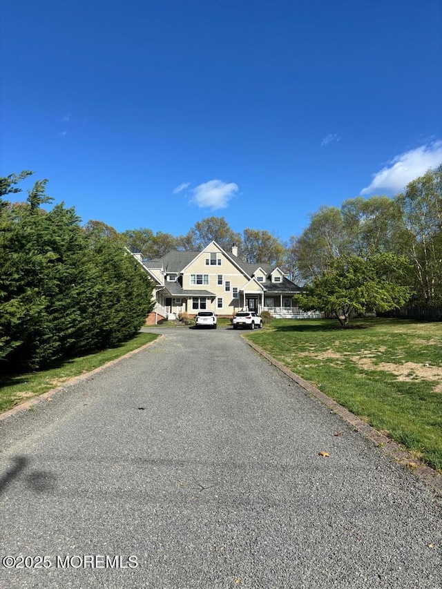 231 Friendship Rd, Howell, NJ 07731 - view of front of house featuring asphalt driveway and a front yard