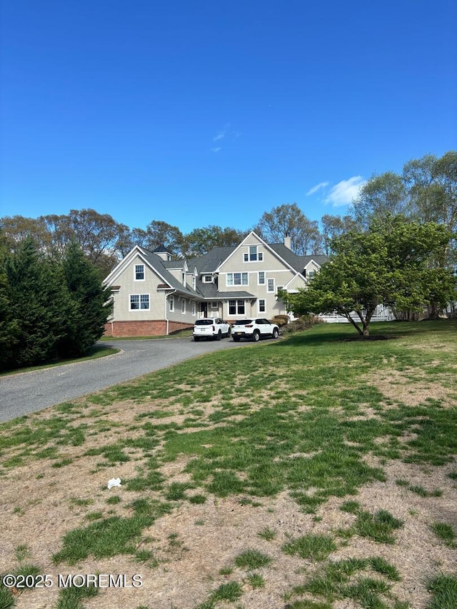 231 Friendship Rd, Howell, NJ 07731 - view of front of property with asphalt driveway and a front yard