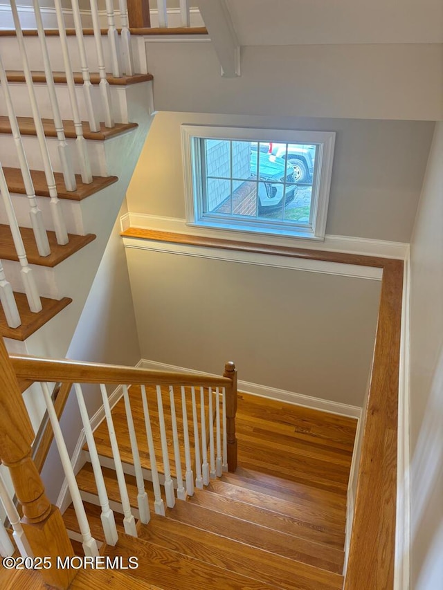 231 Friendship Rd, Howell, NJ 07731 - staircase with wood finished floors and baseboards