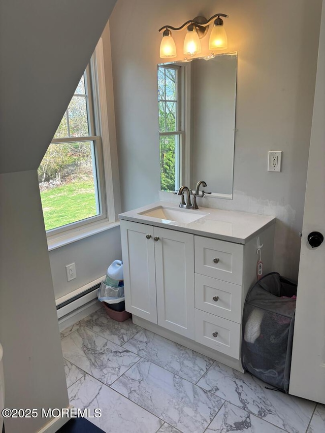 231 Friendship Rd, Howell, NJ 07731 - bathroom with a baseboard heating unit, marble look tile flooring, healthy amount of natural light, and vanity