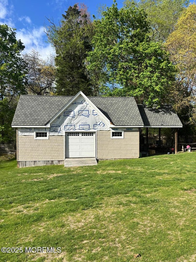 231 Friendship Rd, Howell, NJ 07731 - view of front of home with an outbuilding, a front lawn, and roof with shingles