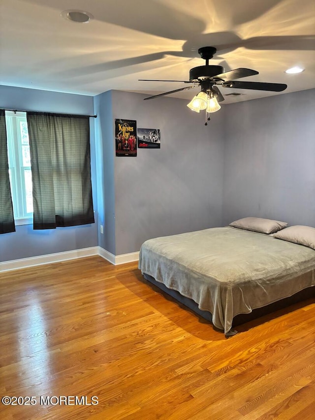 231 Friendship Rd, Howell, NJ 07731 - bedroom with wood finished floors, baseboards, and ceiling fan