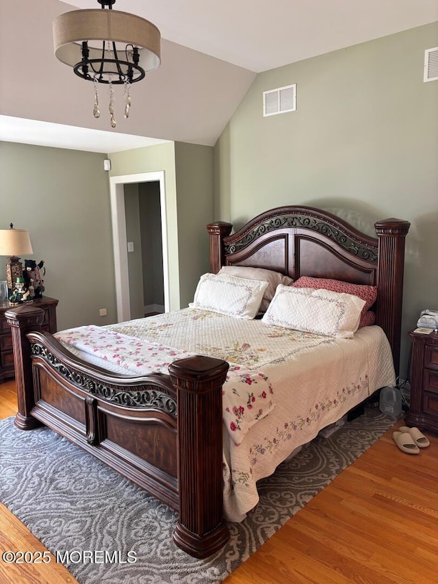 231 Friendship Rd, Howell, NJ 07731 - bedroom with wood finished floors and vaulted ceiling