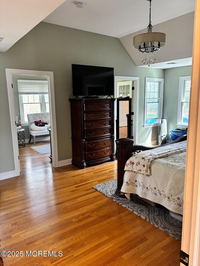 231 Friendship Rd, Howell, NJ 07731 - bedroom featuring vaulted ceiling, light wood finished floors, and baseboards