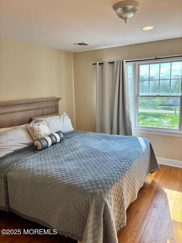 231 Friendship Rd, Howell, NJ 07731 - bedroom featuring wood finished floors and baseboards