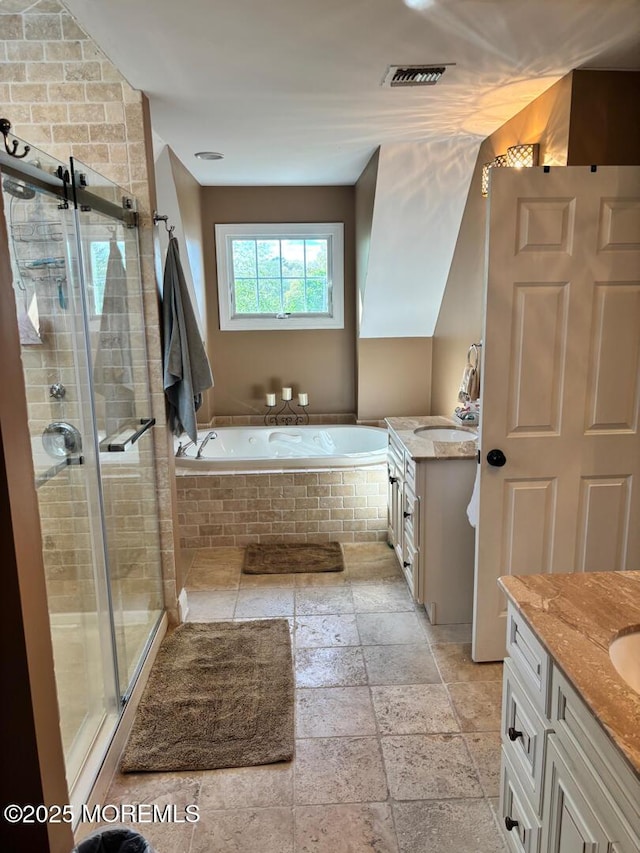 231 Friendship Rd, Howell, NJ 07731 - bathroom with two vanities, a stall shower, a bath, and stone tile flooring