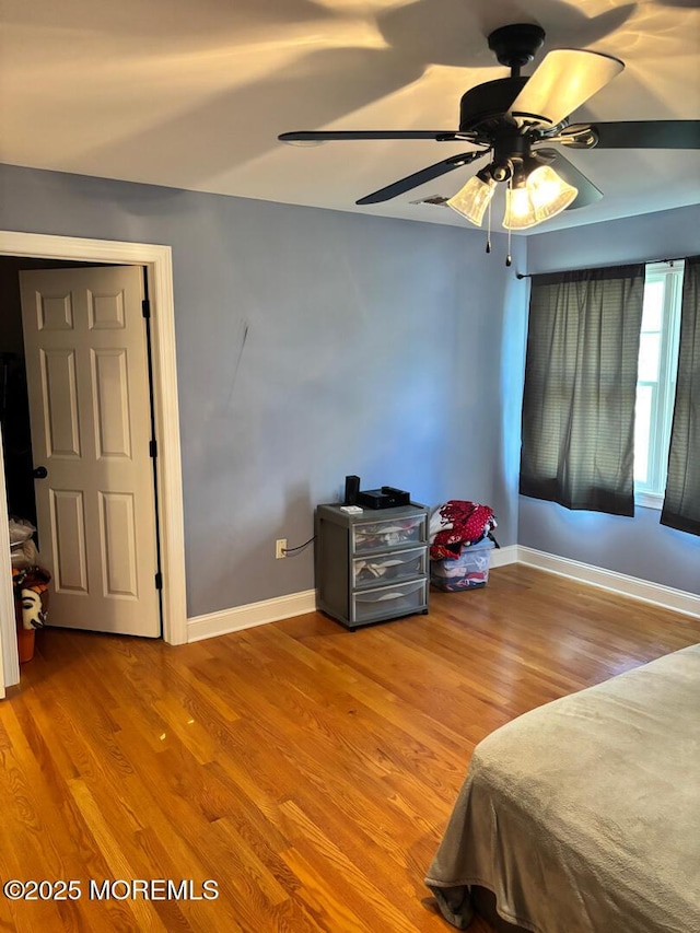 231 Friendship Rd, Howell, NJ 07731 - bedroom with wood finished floors, baseboards, and ceiling fan