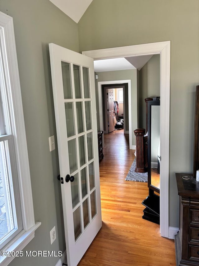 231 Friendship Rd, Howell, NJ 07731 - hall featuring light wood-type flooring, lofted ceiling, french doors, and baseboards
