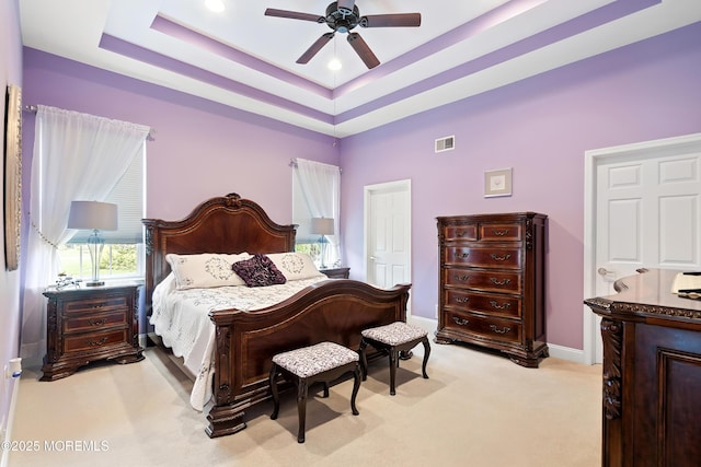 83 Brigantine Blvd, Waretown, NJ 08758 - bedroom with light colored carpet, baseboards, a ceiling fan, and a tray ceiling