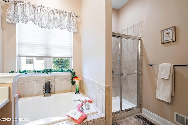 83 Brigantine Blvd, Waretown, NJ 08758 - full bath featuring a stall shower, a bath, and vanity