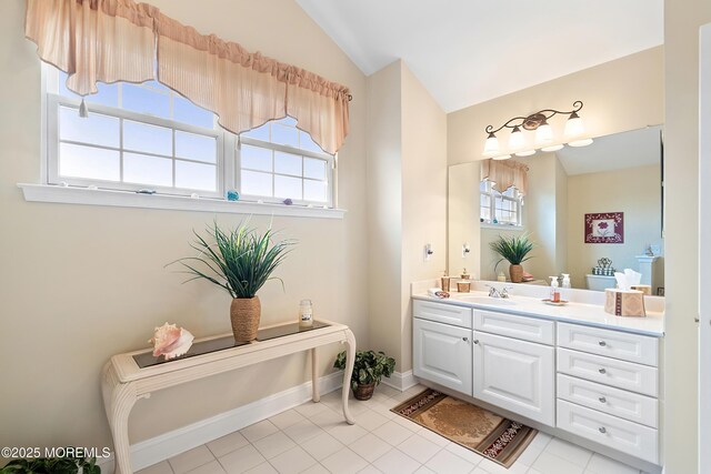 83 Brigantine Blvd, Waretown, NJ 08758 - bathroom with vaulted ceiling, vanity, baseboards, and tile patterned floors