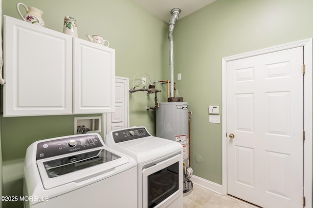 83 Brigantine Blvd, Waretown, NJ 08758 - laundry area featuring cabinet space, washer and clothes dryer, gas water heater, and baseboards