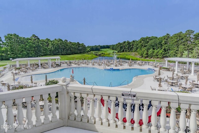 83 Brigantine Blvd, Waretown, NJ 08758 - community pool featuring a pergola and view of wooded area