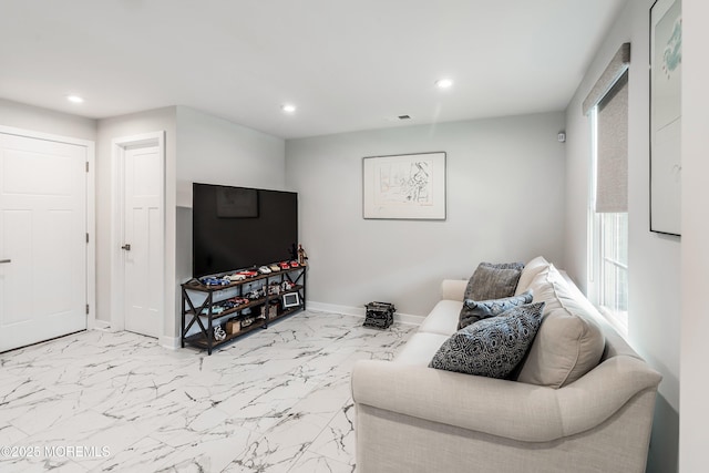 1915 Switzer Ave Unit 1915, Parlin, NJ 08859 - living room featuring baseboards, recessed lighting, and marble look tiles