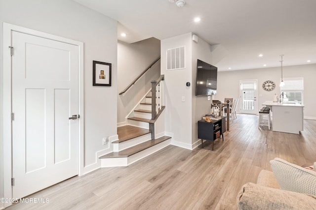 1915 Switzer Ave Unit 1915, Parlin, NJ 08859 - stairway featuring wood finished floors, recessed lighting, and baseboards
