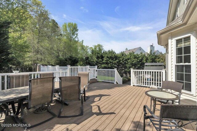 35 Spruce Meadows Dr, Monroe, NJ 08831 - wooden deck with outdoor dining area
