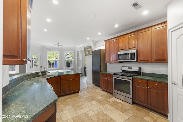 17 Meadow Run Ct, Jackson, NJ 08527 - kitchen featuring appliances with stainless steel finishes, a sink, dark countertops, recessed lighting, and stone tile floors