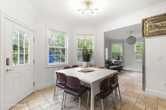 17 Meadow Run Ct, Jackson, NJ 08527 - dining space featuring stone tile flooring, a chandelier, baseboards, and ornamental molding
