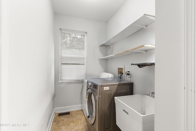 17 Meadow Run Ct, Jackson, NJ 08527 - washroom featuring baseboards, light stone finish floors, and washer and dryer