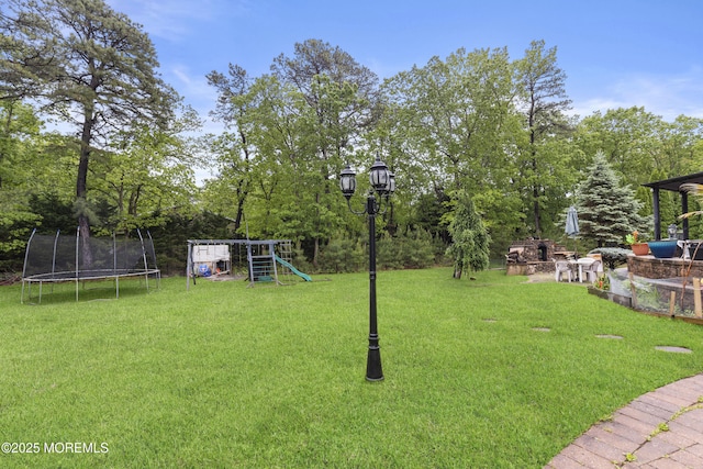 17 Meadow Run Ct, Jackson, NJ 08527 - view of green lawn with a trampoline and a playground