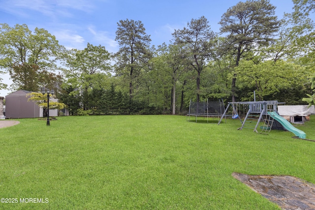 17 Meadow Run Ct, Jackson, NJ 08527 - view of grassy yard with a trampoline and a playground
