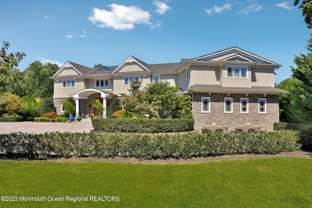 211 Cedar Ave, Long Branch, NJ 07740 - view of front of property with stone siding and a front yard