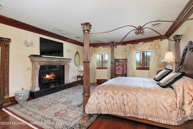 211 Cedar Ave, Long Branch, NJ 07740 - bedroom featuring dark wood finished floors, ornamental molding, a premium fireplace, and baseboards