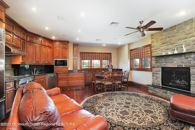 211 Cedar Ave, Long Branch, NJ 07740 - living room featuring dark wood finished floors, a ceiling fan, recessed lighting, and a fireplace