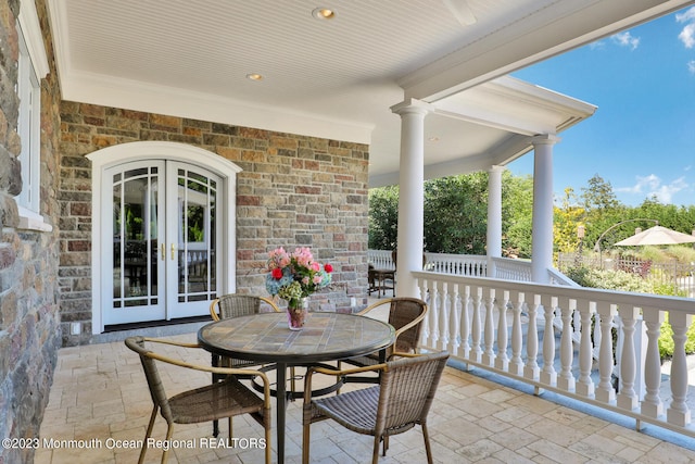 211 Cedar Ave, Long Branch, NJ 07740 - covered porch with french doors and outdoor dining space