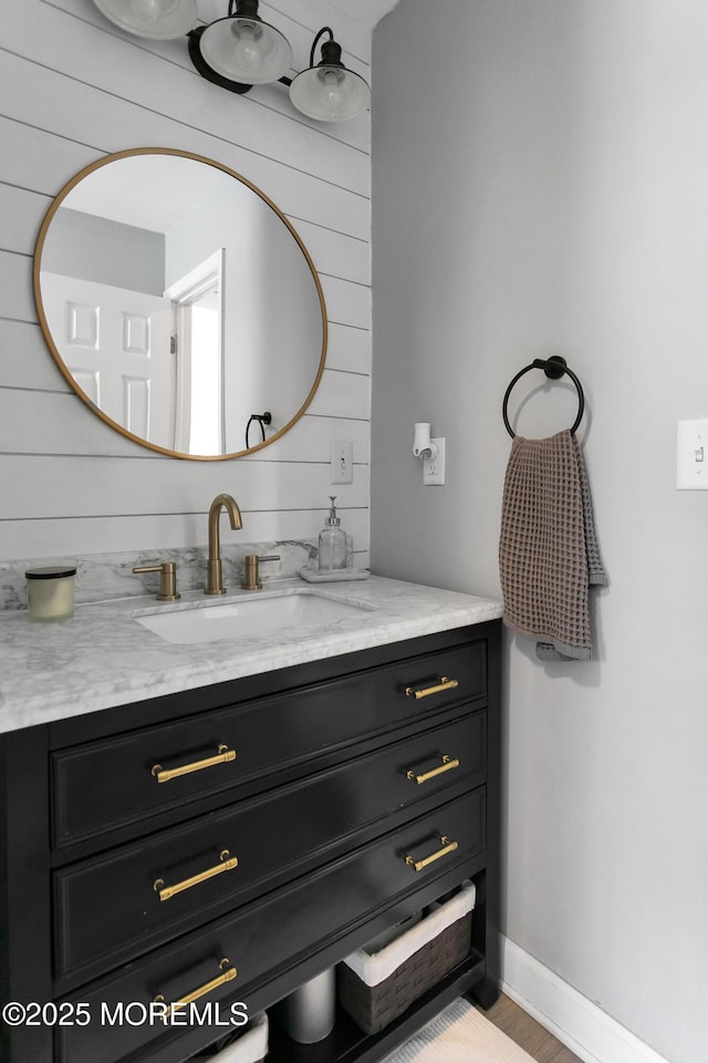 469 E Rd, Belford, NJ 07718 - bathroom with vanity, baseboards, and wood finished floors