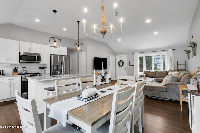 469 E Rd, Belford, NJ 07718 - dining area with lofted ceiling, dark wood-type flooring, a chandelier, and recessed lighting