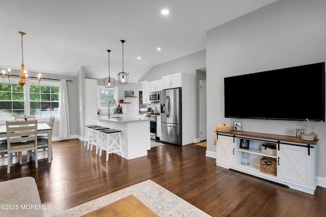469 E Rd, Belford, NJ 07718 - living area featuring a chandelier, dark wood-type flooring, lofted ceiling, baseboards, and recessed lighting