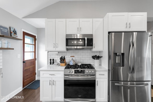 469 E Rd, Belford, NJ 07718 - kitchen featuring stainless steel appliances, light countertops, dark wood-type flooring, white cabinets, and backsplash