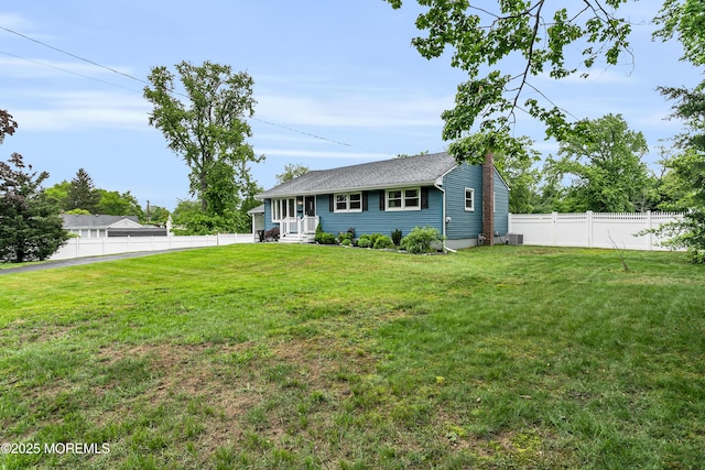 469 E Rd, Belford, NJ 07718 - view of front facade featuring a chimney and central air condition unit