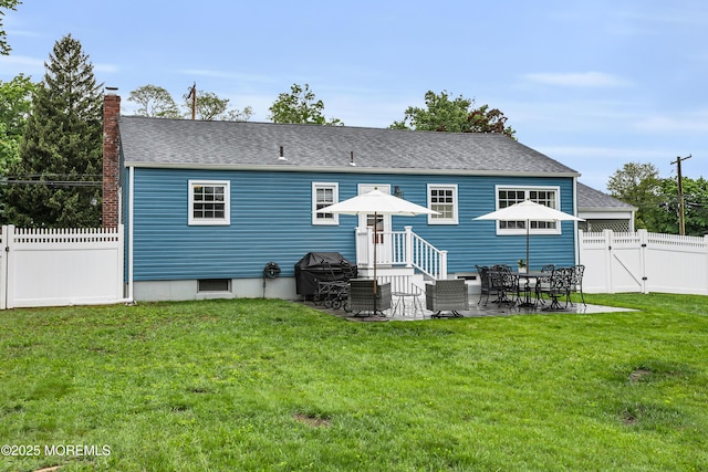 469 E Rd, Belford, NJ 07718 - rear view of property with a gate, a chimney, a patio, and a shingled roof