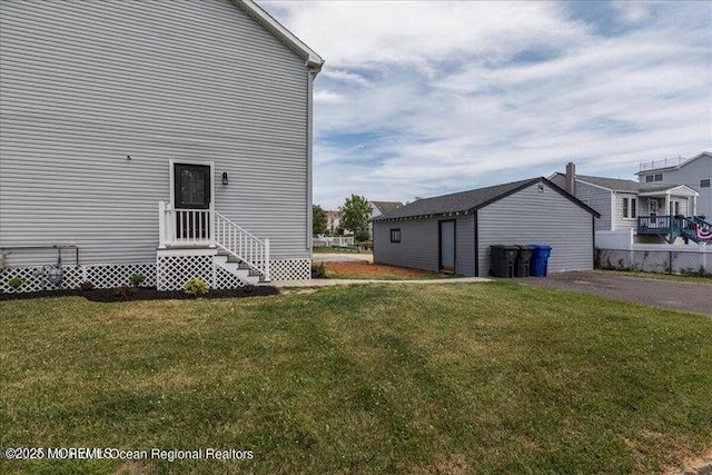 110 Island Rd, Toms River, NJ 08753 - back of house with a yard and an outbuilding