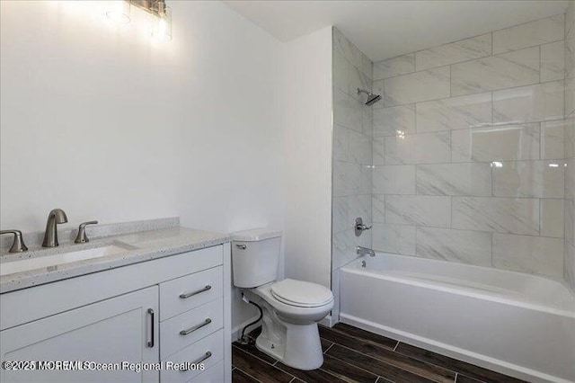 110 Island Rd, Toms River, NJ 08753 - bathroom featuring toilet, bathtub / shower combination, vanity, and wood finish floors