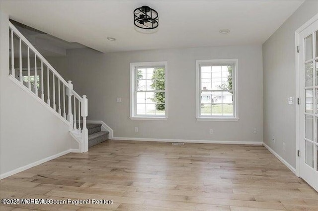 110 Island Rd, Toms River, NJ 08753 - foyer entrance with stairway, light wood-type flooring, and baseboards