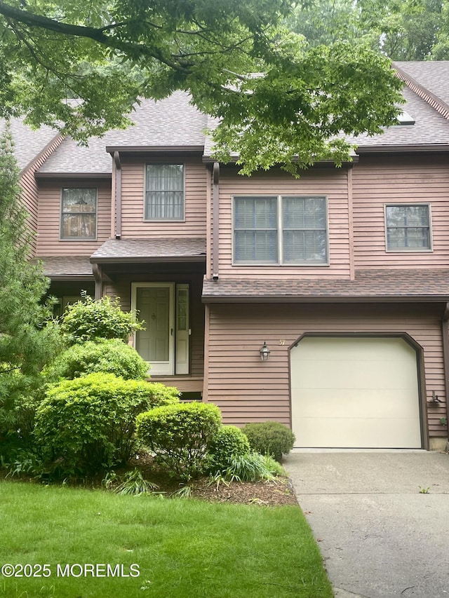 57 Pape Dr, Atlantic Highlands, NJ 07716 - view of front of home with an attached garage, a shingled roof, and driveway