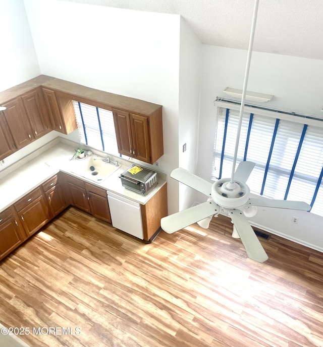 57 Pape Dr, Atlantic Highlands, NJ 07716 - kitchen with light wood-style flooring, healthy amount of natural light, and a sink