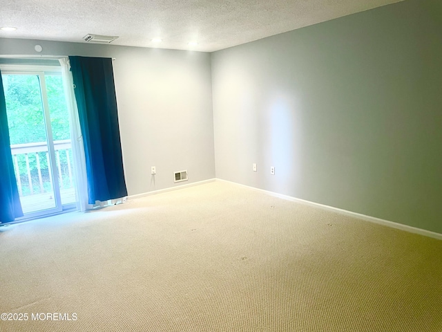 57 Pape Dr, Atlantic Highlands, NJ 07716 - empty room with carpet, a textured ceiling, and baseboards