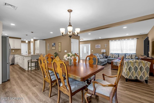 119 Darien Rd, Howell, NJ 07731 - dining room featuring wood finished floors, a chandelier, and recessed lighting