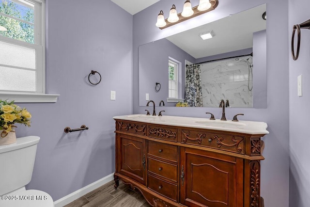 119 Darien Rd, Howell, NJ 07731 - bathroom with toilet, baseboards, plenty of natural light, and double vanity