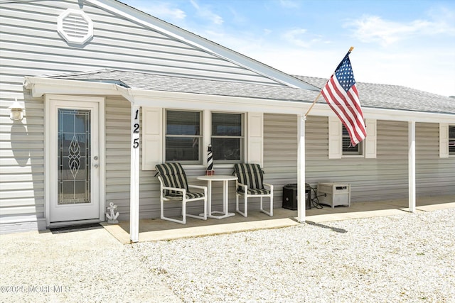 125 Bloomfield Rd, Barnegat, NJ 08005 - back of house with a shingled roof and a porch