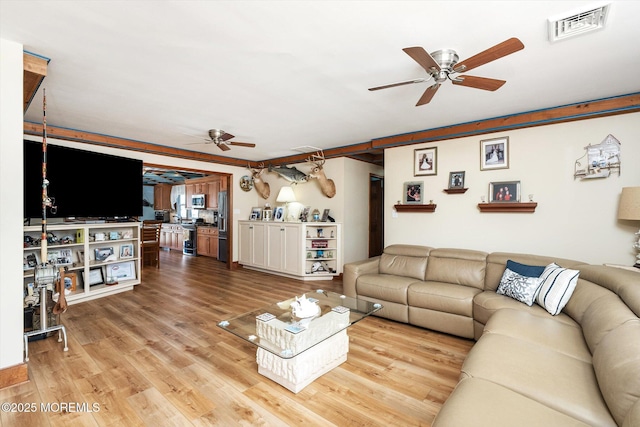 125 Bloomfield Rd, Barnegat, NJ 08005 - living area with ceiling fan and light wood-type flooring
