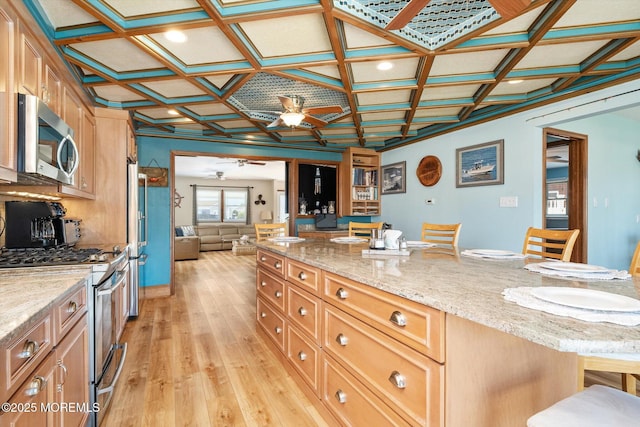 125 Bloomfield Rd, Barnegat, NJ 08005 - kitchen featuring appliances with stainless steel finishes, ceiling fan, coffered ceiling, light wood finished floors, and a breakfast bar area